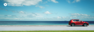 Electric SUV against an ocean backdrop